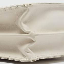 مملوكة مسبقًا Balenciaga Off White Leather Perforated Logo Pochette Bag