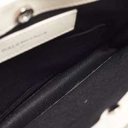 مملوكة مسبقًا Balenciaga Off White Leather Perforated Logo Pochette Bag
