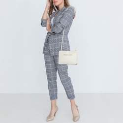 مملوكة مسبقًا Balenciaga Off White Leather Perforated Logo Pochette Bag