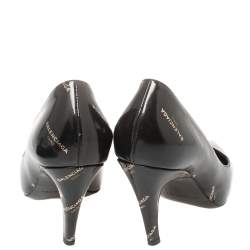 Pre Owned Balenciaga Black/Gold Logo Printed Leather Talon Slash Heel Pointed Toe Pumps Size 38