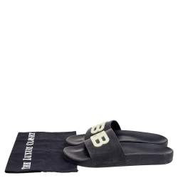 Pre Owned حذاء سلايدز بالنسياغا فلات شعار بي بي مطاط أسود مقاس 38