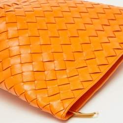 مملوكة مسبقًا Bottega Veneta Orange Intrecciato Leather Twist Clutch