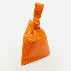 مملوكة مسبقًا Bottega Veneta Orange Intrecciato Leather Twist Clutch