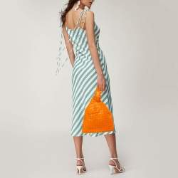 مملوكة مسبقًا Bottega Veneta Orange Intrecciato Leather Twist Clutch