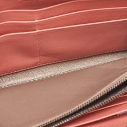 Pre Owned Bottega Veneta Peach/Brown Intrecciato Karung Leather Zip Continental Wallet