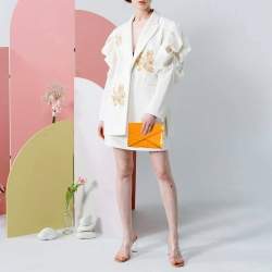 مملوكة مسبقًا حقيبة كلاتش بوتيغا فينيتا برتقالية بيانو جلد تمساح