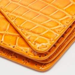 مملو�كة مسبقًا حقيبة كلاتش بوتيغا فينيتا برتقالية بيانو جلد تمساح