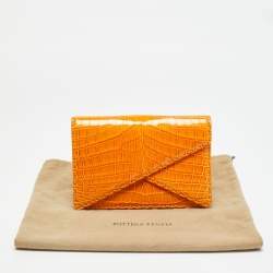 مملوكة مسبقًا حقيبة كلاتش بوتيغا فينيتا برتقالية بيانو جلد تمساح