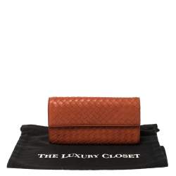 Pre Owned Bottega Veneta Orange Intrecciato Leather Continental Flap Wallet