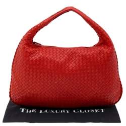 Pre Owned Bottega Veneta Orange Intrecciato Leather Medium Veneta Hobo