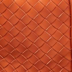 Pre Owned Bottega Veneta Orange Intrecciato Leather Zip Strap Pouch