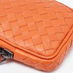 Pre Owned Bottega Veneta Orange Intrecciato Leather Zip Strap Pouch