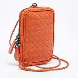 Pre Owned Bottega Veneta Orange Intrecciato Leather Zip Strap Pouch