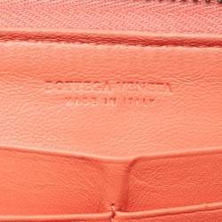 Pre Owned Bottega Veneta Coral Red Intrecciato Leather Zip Around Wallet