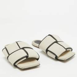 مملوكة مسبقًا Bottega Veneta Beige/Black Canvas and Leather Lido Flat Slides Size 38