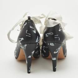 Pre Owned Boutique Moschino Printed Black Leather Ankle Wrap Pumps Size 37