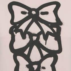 Pre Owned توب بوتيك موسكينو كريب بدون أكمام بطبعة فيونكة وردية مقاس وسط (ميديوم)