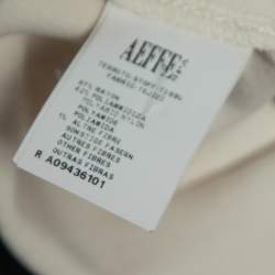 Pre Owned Boutique Moschino Cream Stretch Knit Ruffled Hem Top S