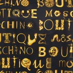 Pre Owned Boutique Moschino Black/Gold Printed Cotton Ruffled Top M