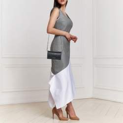 مملوكة مسبقًا محفظة بسلسلة بربري جلد أسود