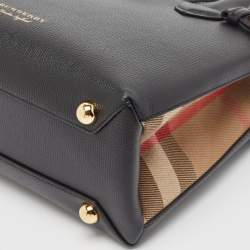مملوكة مسبقًا حقيبة يد توتس بربري بانير قماش كاروهات هاوس وجلد أسود/ بيج صغيرة