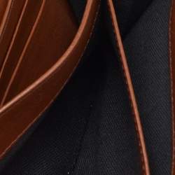 Pre Owned Burberry Brown/Beige Fabric and Leather Leighton Continental Wallet