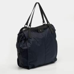 مملوكة مسبقًا حقيبة يد توتس بربري بوكليه جلد ونايلون كاروهات نوفا أسود/أزرق كحلي 