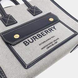 مملوكة مسبقًا حقيبة يد توتس بربري فريا قماش بيج/أسود صغيرة