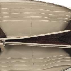 Pre Owned Burberry Beige Smoke Checked PVC and Leather Zip Around Wallet