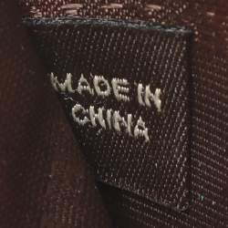 Pre Owned Burberry Beige Smoke Checked PVC and Leather Zip Around Wallet