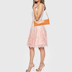Pre Owned Burberry Orange Patent Leather Clutch Bag