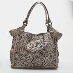 Pre Owned Burberry Metallic Taupe Laser Cut Leather and Coated Canvas Tote