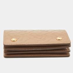 Pre Owned Burberry Beige TB Embossed Leather Jessie Card Case 