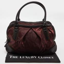 مملوكة مسبقًا حقيبة بربري جلد ونايلون نوفاتشيك أسود بسحاب مزدوج