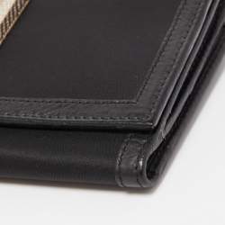 Pre Owned Burberry Black Nylon and Leather Flap Continental Wallet