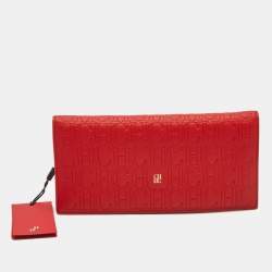 Pre Owned Carolina Herrera Red Monogram Embossed Leather Bifold Long Wallet