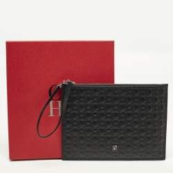 Pre Owned Carolina Herrera Black Monogram Embossed Leather Wristlet Pouch