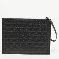 Pre Owned Carolina Herrera Black Monogram Embossed Leather Wristlet Pouch