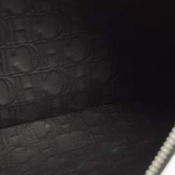 Pre Owned Carolina Herrera Black Monogram Embossed Leather Wristlet Pouch