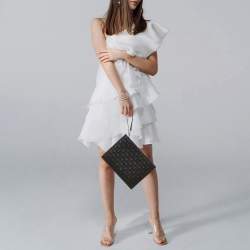 Pre Owned Carolina Herrera Black Monogram Embossed Leather Wristlet Pouch