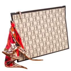 Pre Owned Carolina Herrera Ivory/Brown Monogram Canvas and Leather Zip Pouch