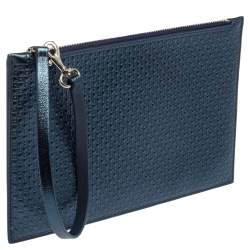 Pre Owned Carolina Herrera Metallic Blue Micro Monogram Embossed Leather Wristlet Pouch