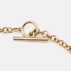 Pre Owned Carolina Herrera CH Logo Charm Gold Tone Long Toggle Pendant Necklace