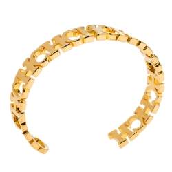 Pre Owned Carolina Herrera Gold Tone Between the Line Open Cuff Bracelet