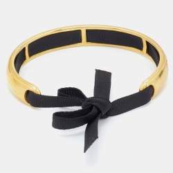 Pre Owned Carolina Herrera CH Gold Tone Ribbon Tie-Up Cuff Bracelet