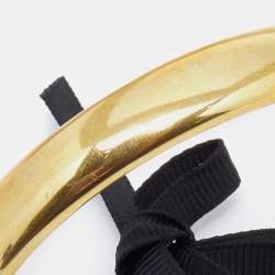 Pre Owned Carolina Herrera CH Gold Tone Ribbon Tie-Up Cuff Bracelet