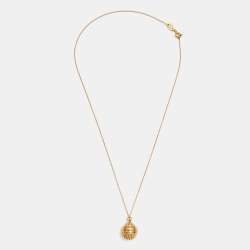 Pre Owned Carolina Herrera Textured Gold Tone Round Pendant Necklace