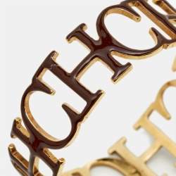 Carolina Herrera CH Motif Enamel Gold Tone Bangle Bracelet