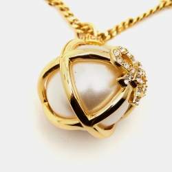Pre Owned Carolina Herrera CH Faux Pearl Gold Tone Bow Ball Pendant Necklace