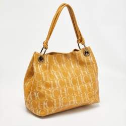 Carolina Herrera Gold/Mustard Monogram Embossed Leather Ring Handle Hobo